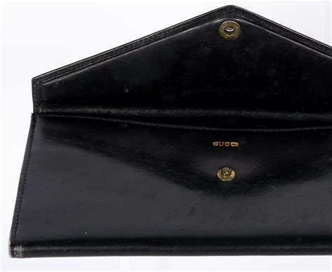 original black gucci wallet|vintage Gucci wallet black.